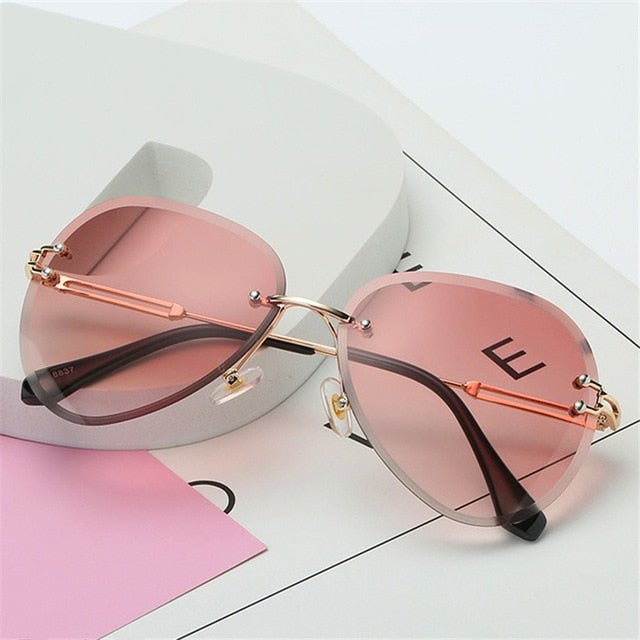 Luxury Rimless Sunglasses Women Design 2019